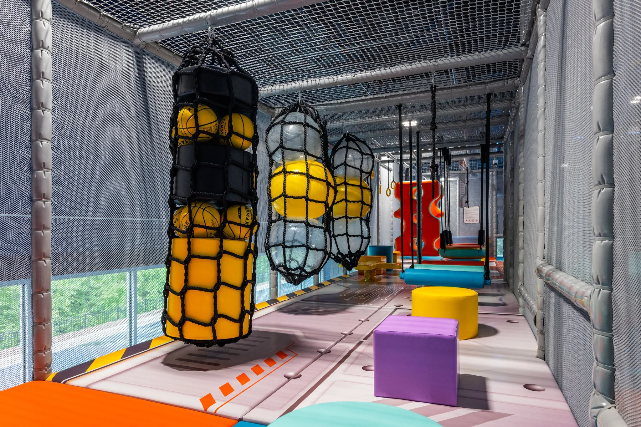 Colorful obstacle course inside Happy Feet Planet