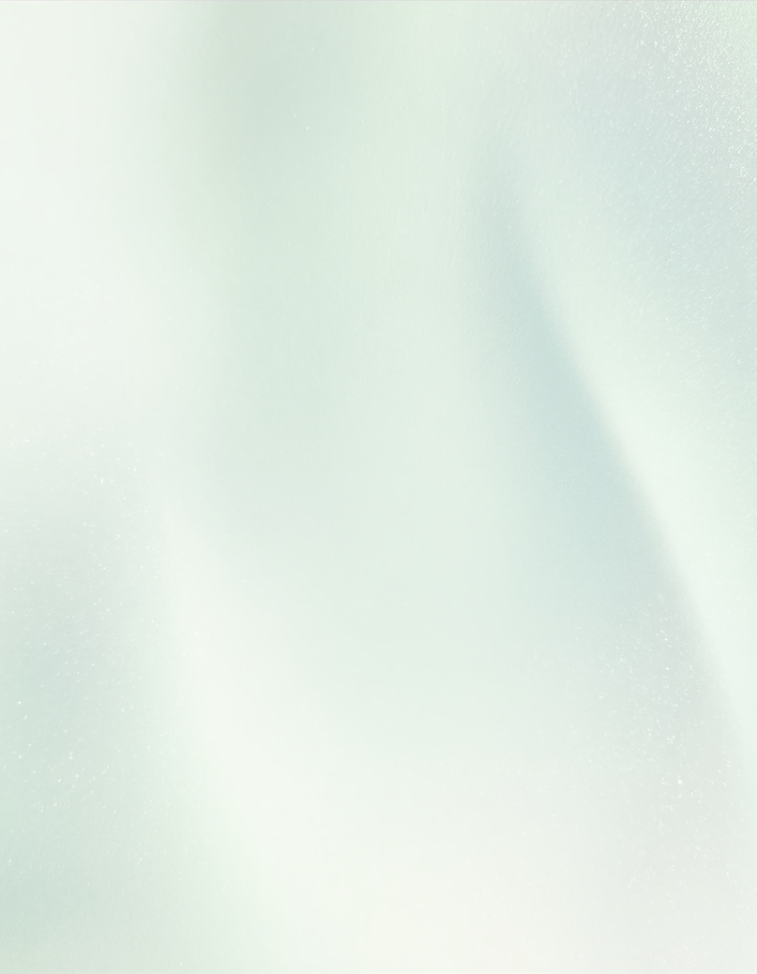 A blurry image of a green and white background.