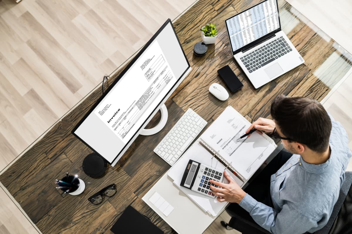 CPA firm partner working on computer supported by PCC's IT services