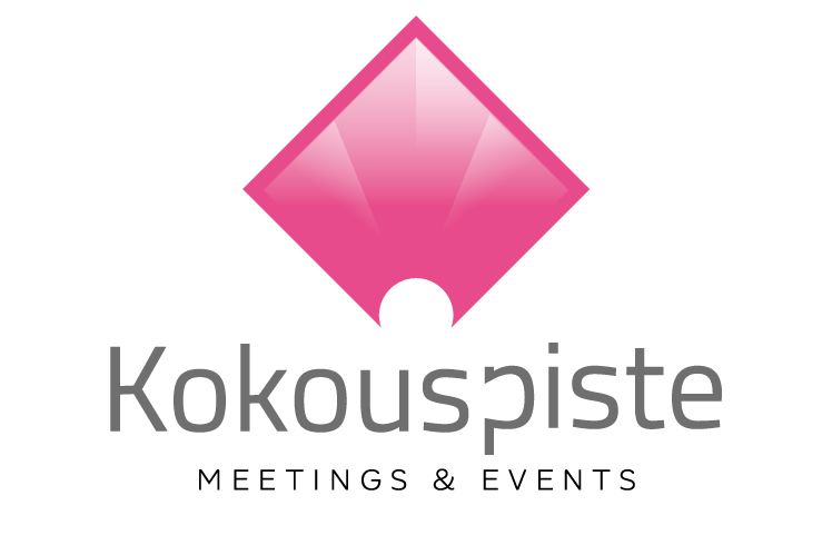 Kokouspiste-logo, jossa on pinkki timantin muotoinen kuvio ja harmaa teksti 'Kokouspiste' alla.