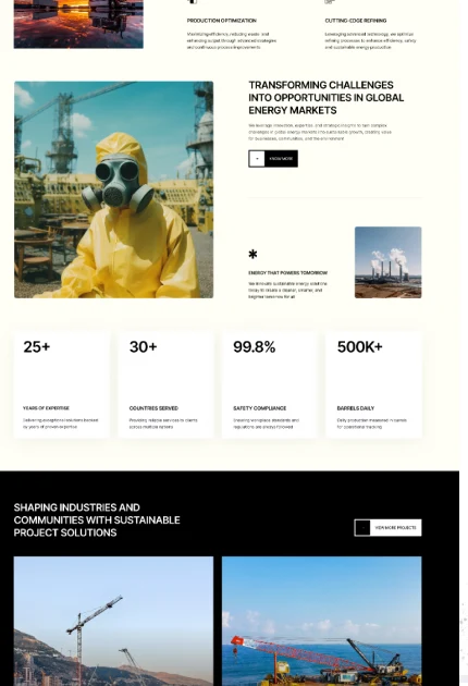 Person wearing a yellow hazmat suit and gas mask at an industrial construction site with cranes in the background.