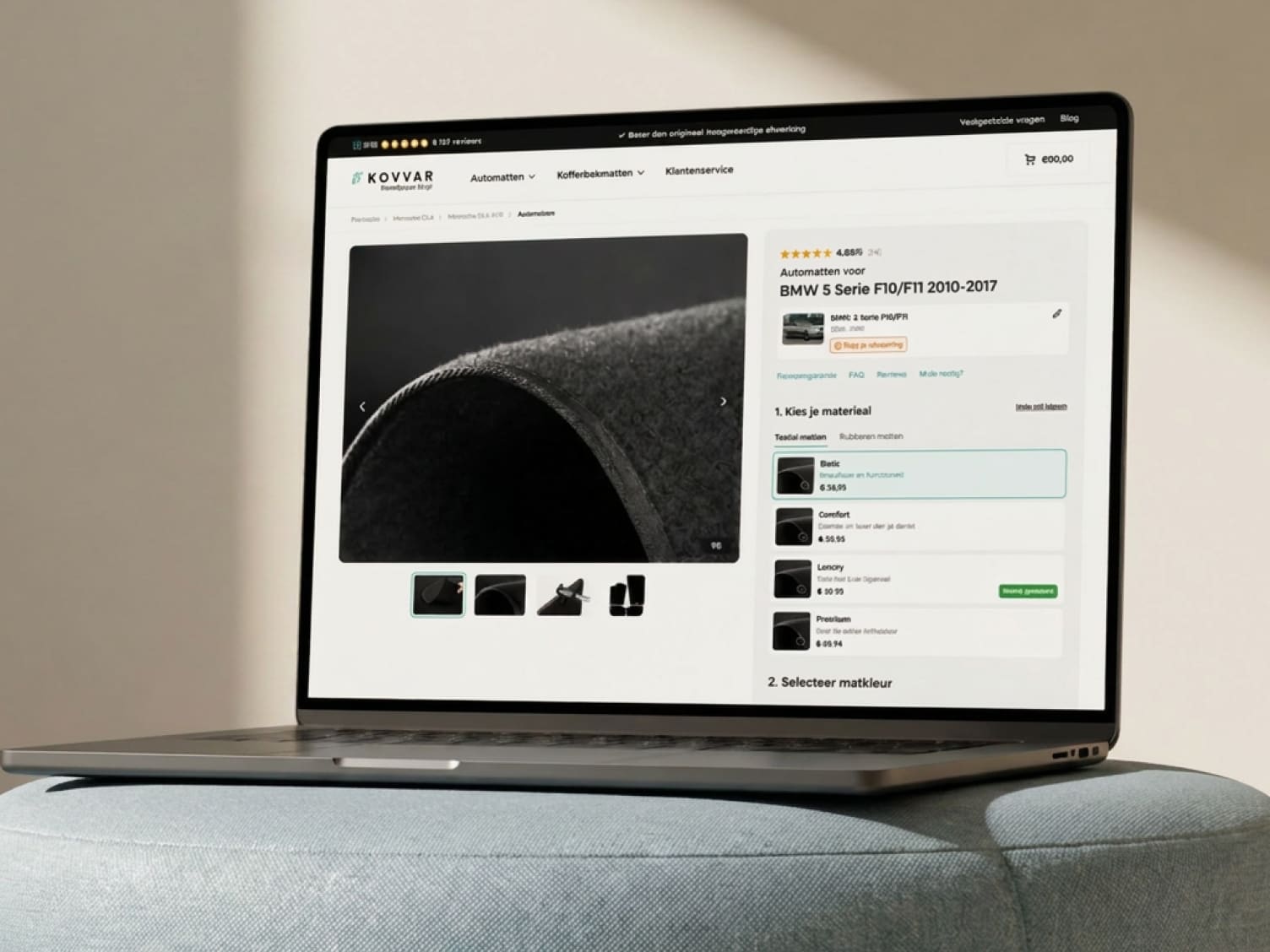 Laptop toont website met automatten voor BMW 5 Serie F10/F11 2010-2017, met keuze voor materiaaltype.