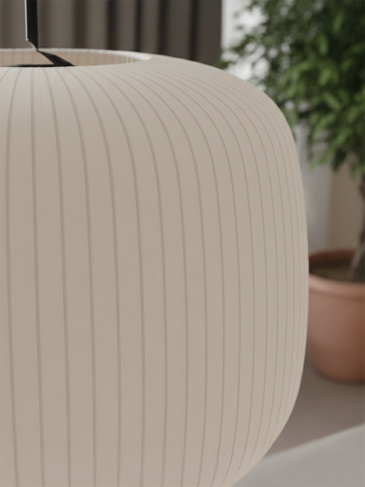 An extreme close-up of the lampshade, highlighting the fine, vertical ribbed texture of the cream-colored fabric.