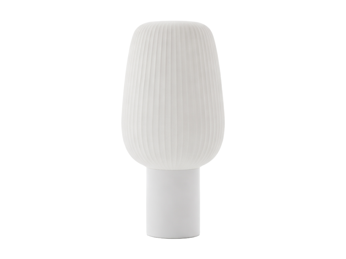 Unlit white ribbed lamp isolated against a plain background.