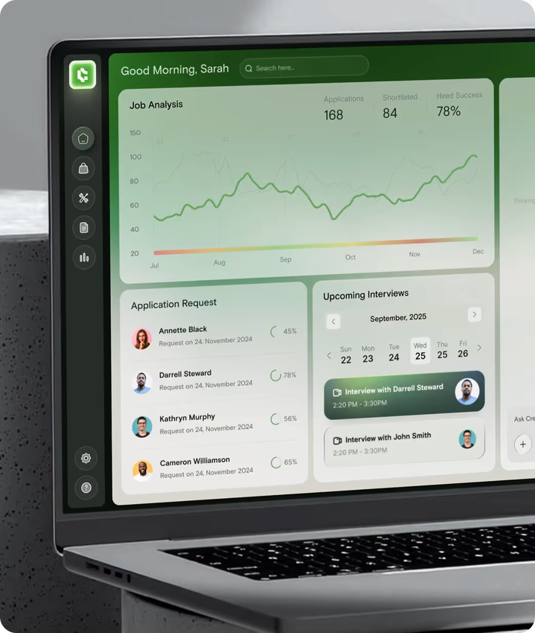 Laptop screen showing a recruitment dashboard with job analysis graph, application requests with candidate photos and progress, and upcoming interviews scheduled for September 2025.