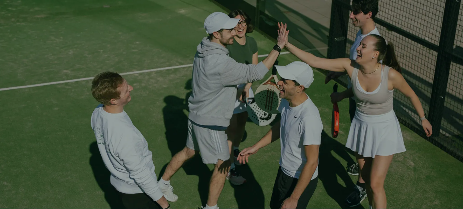 A group of people playing padel