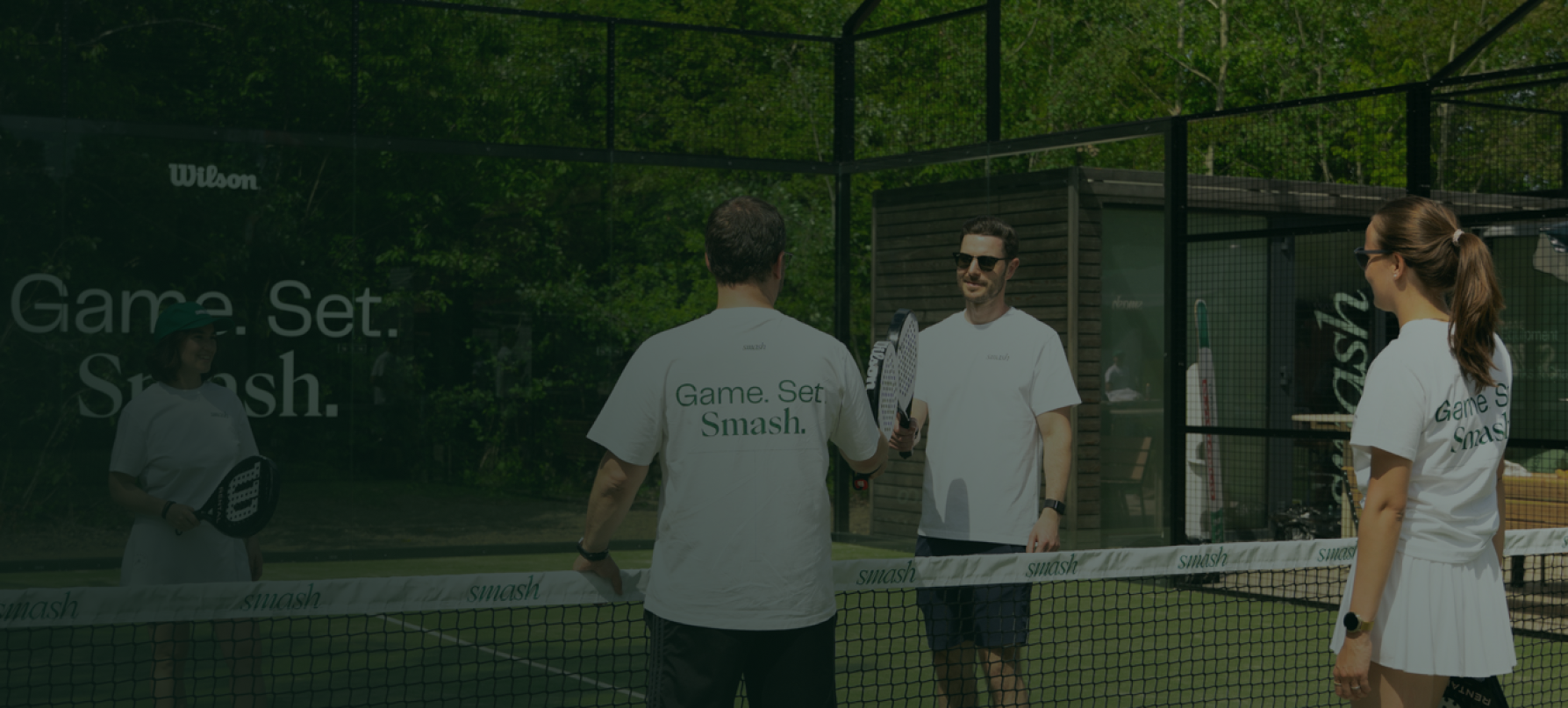 A group of people playing padel
