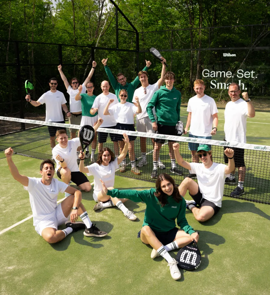 A group of people on a padel court