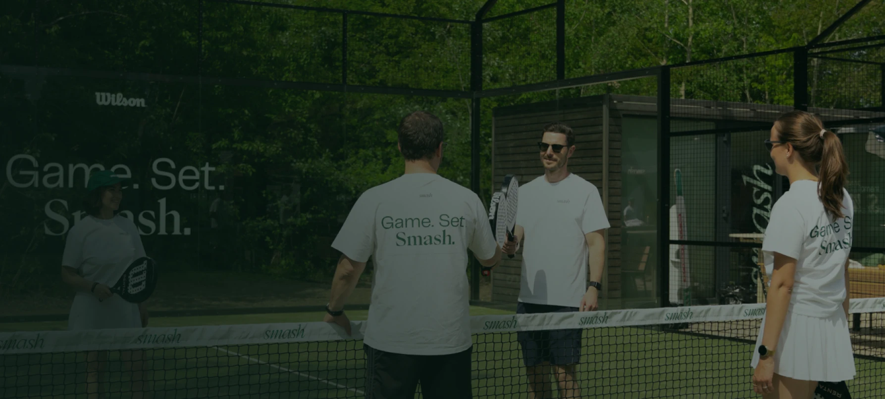 A group of people playing padel