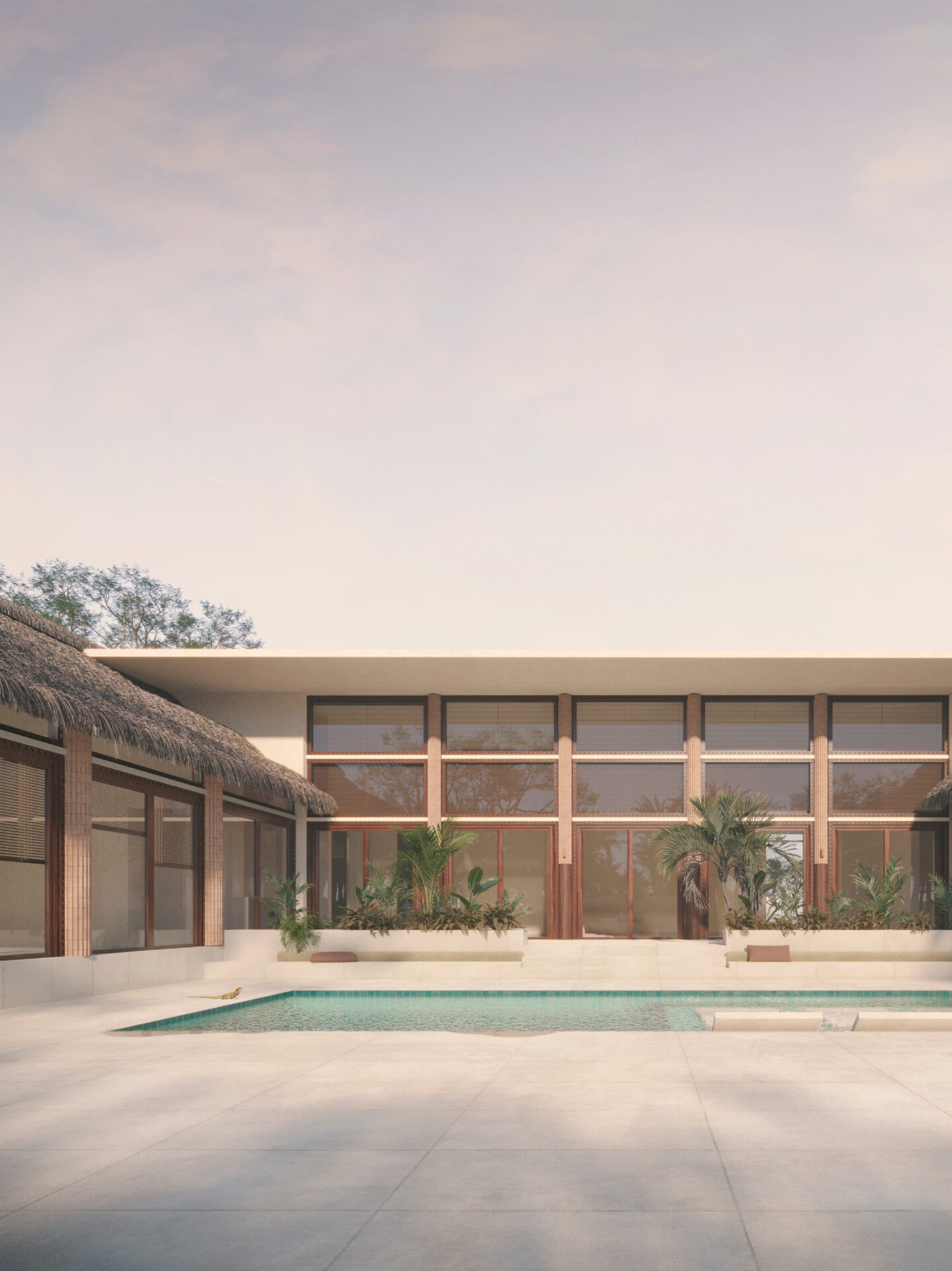 POOLSIDE VIEW | With expansive glazing, planted terraces, and shaded thatched roof wings.