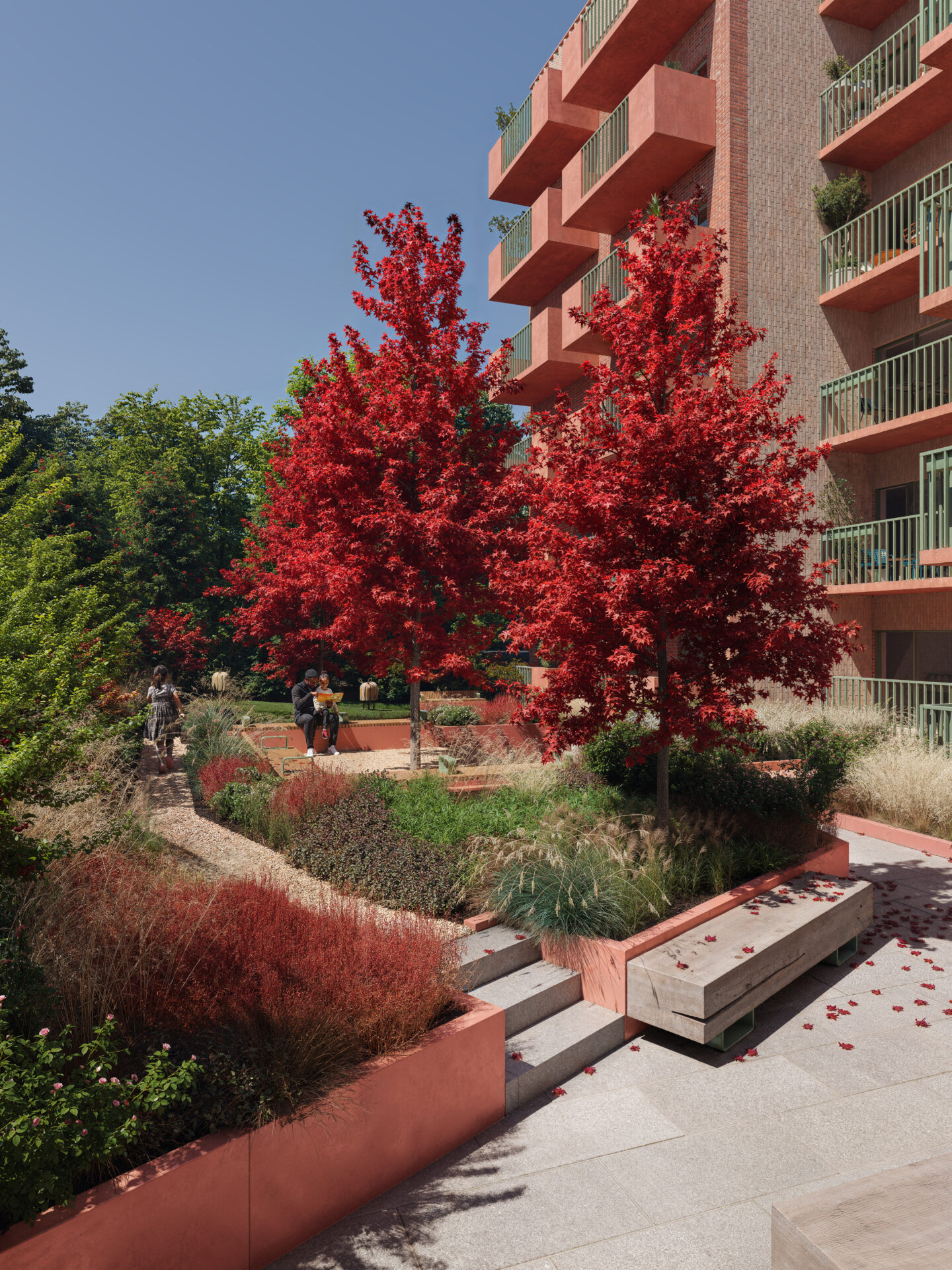 COMMUNITY-FOCUSED DESIGN | Shared courtyard space framed by contemporary brick façades, encouraging interaction and connection.