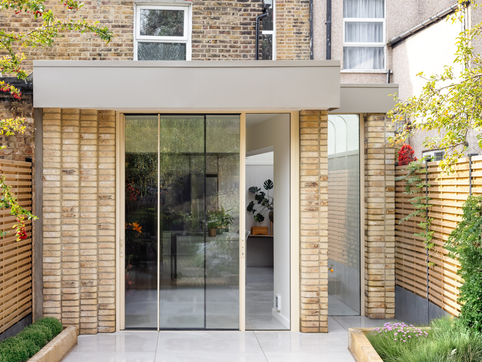 Grove Park | Exterior perspective from the garden showcasing the modern, airy rear extension.