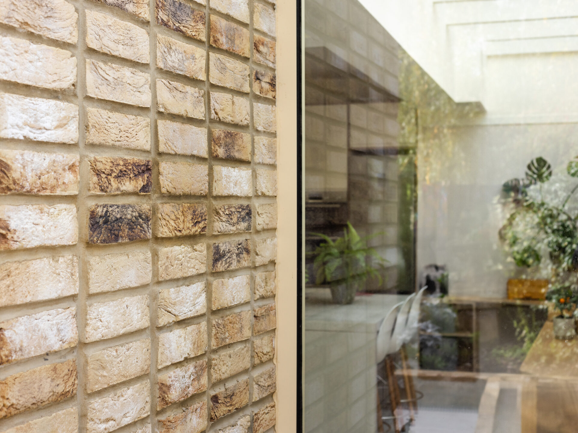 Heritage materiality | Textural brick detail linking the Grove Park extension to the historic character of the site.