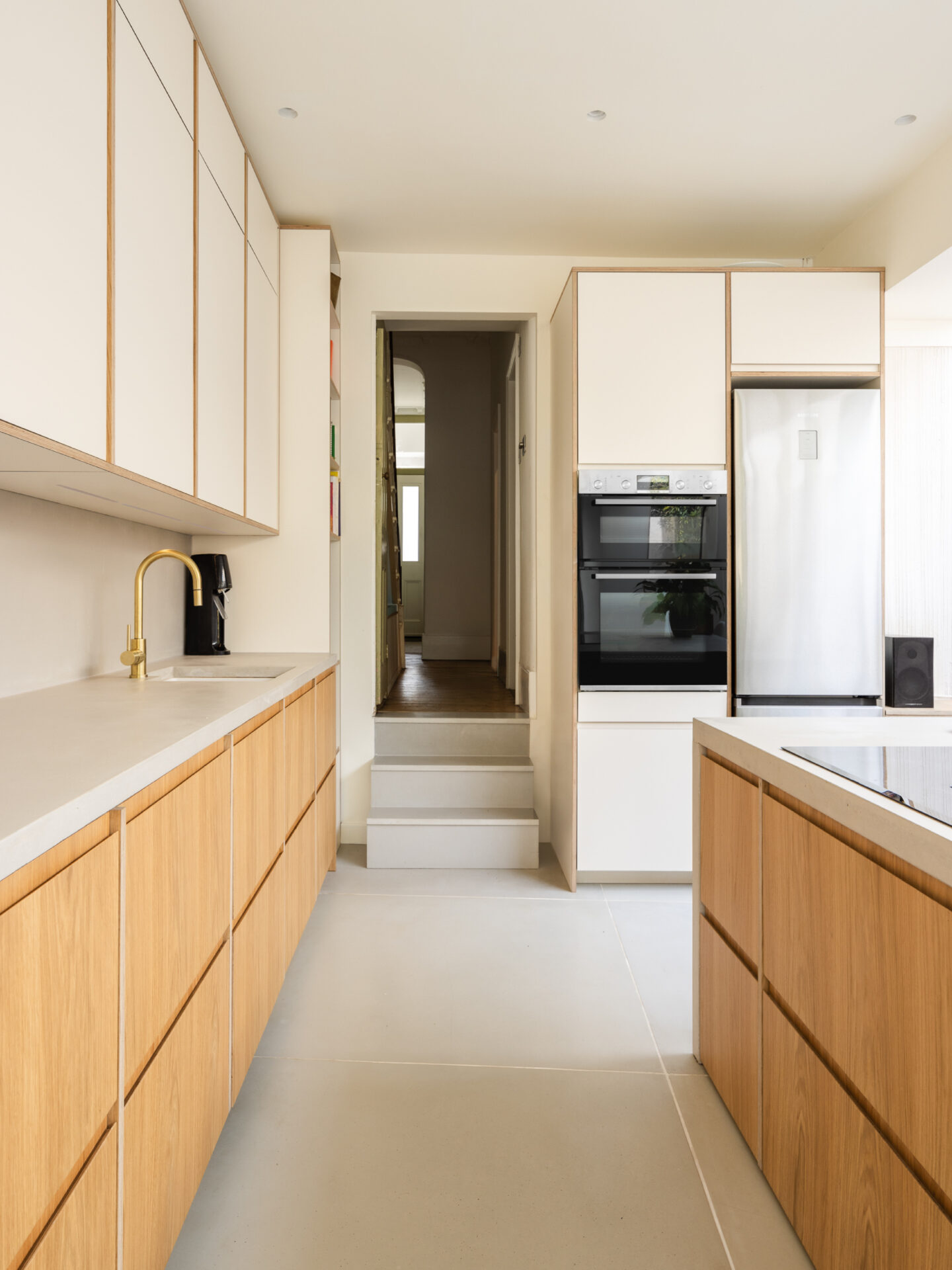 Timeless updates | Contemporary kitchen design featuring textural oak cabinetry for a warm, natural finish.