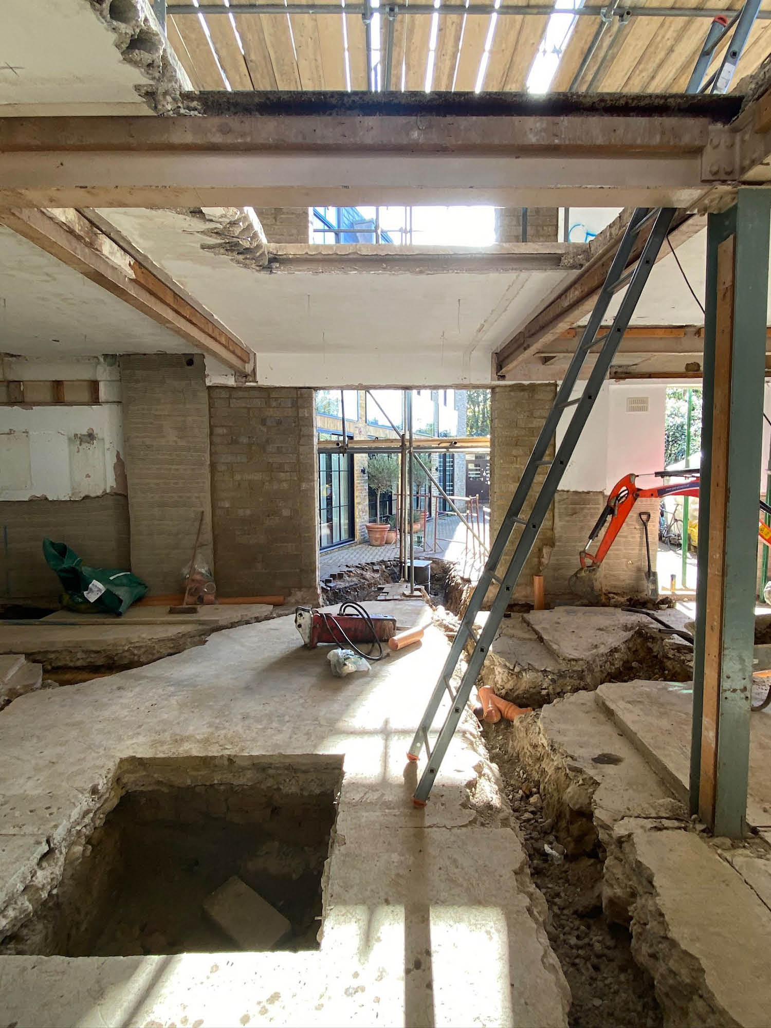 STRUCTURAL TRANSFORMATION IN PROGRESS | Exposing the existing framework to reconfigure the building’s foundations, enabling a layout that supports both the structural demands and the creation of an open, light-filled family home.