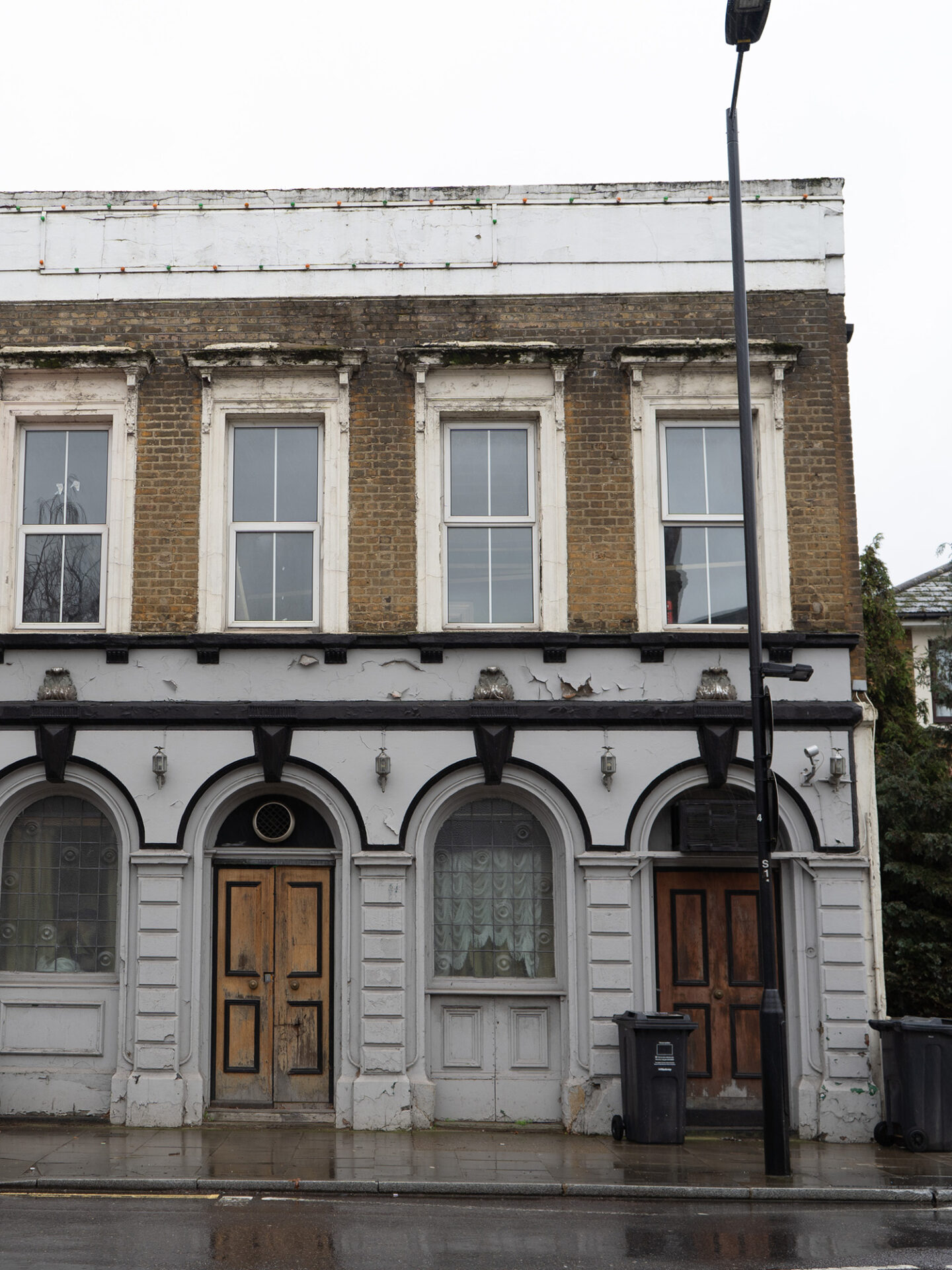 THE ALBION EXISTING CONDITION | Historic brick façade awaiting restoration to revive its architectural character.