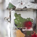 ARCHITECTURAL PATINA | Close-up of façade brickwork with peeling paint revealing the colourful past of the Lord Napier pub.