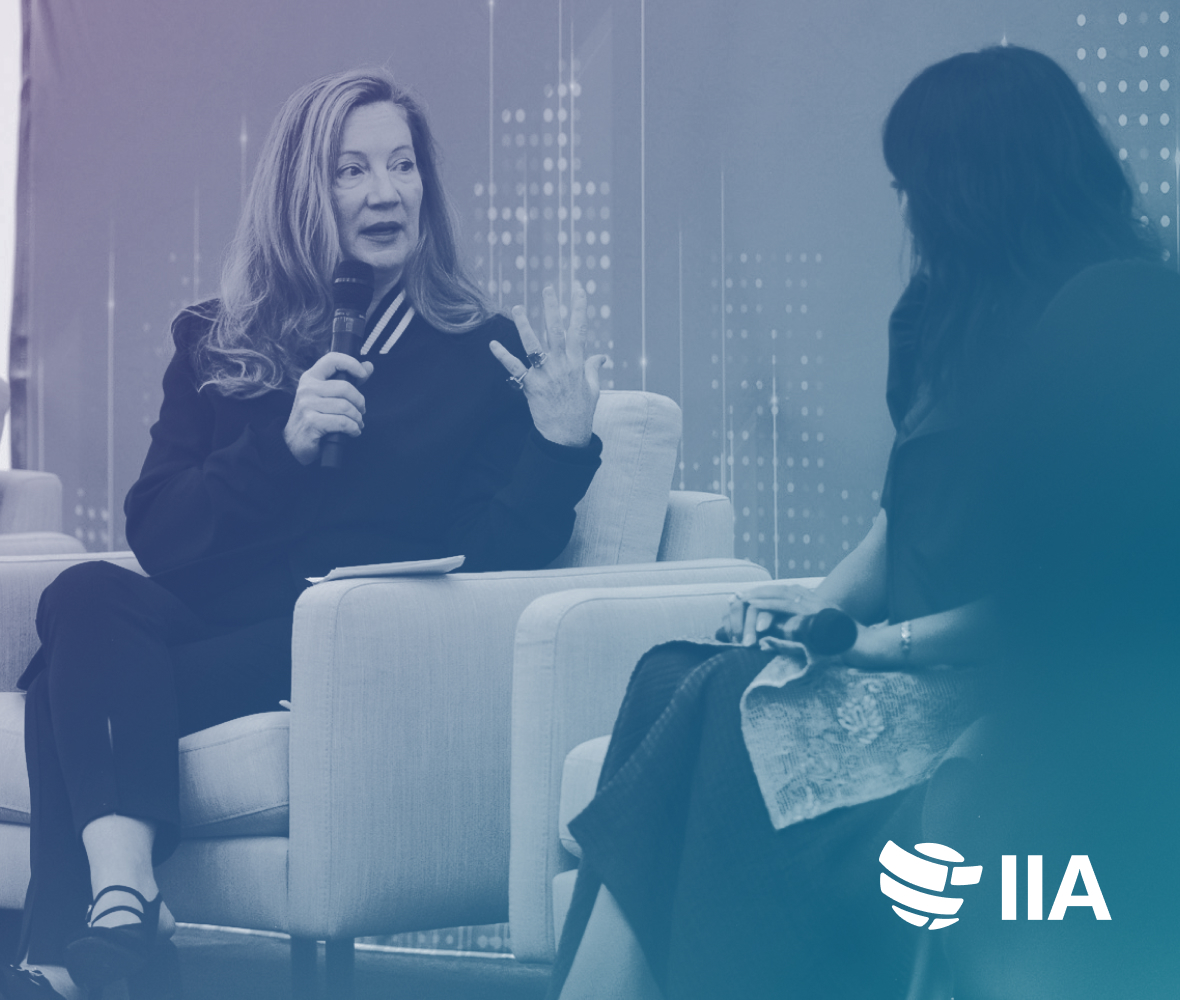 Emily Duban, President of RAD Amplify, speaking on stage at the IIA Summit.