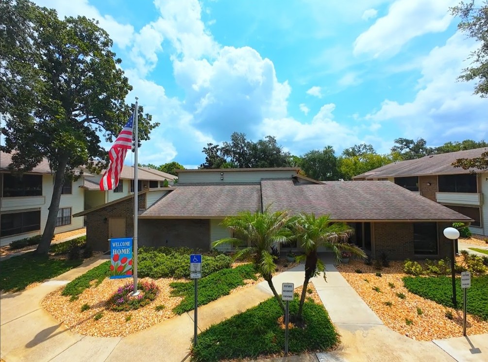 Exterior of clubhouse with trees
