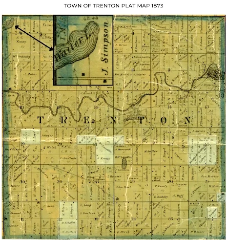 1873 plat map of the Town of Trenton showing property divisions, owner names, and geographical features like lakes and creeks.