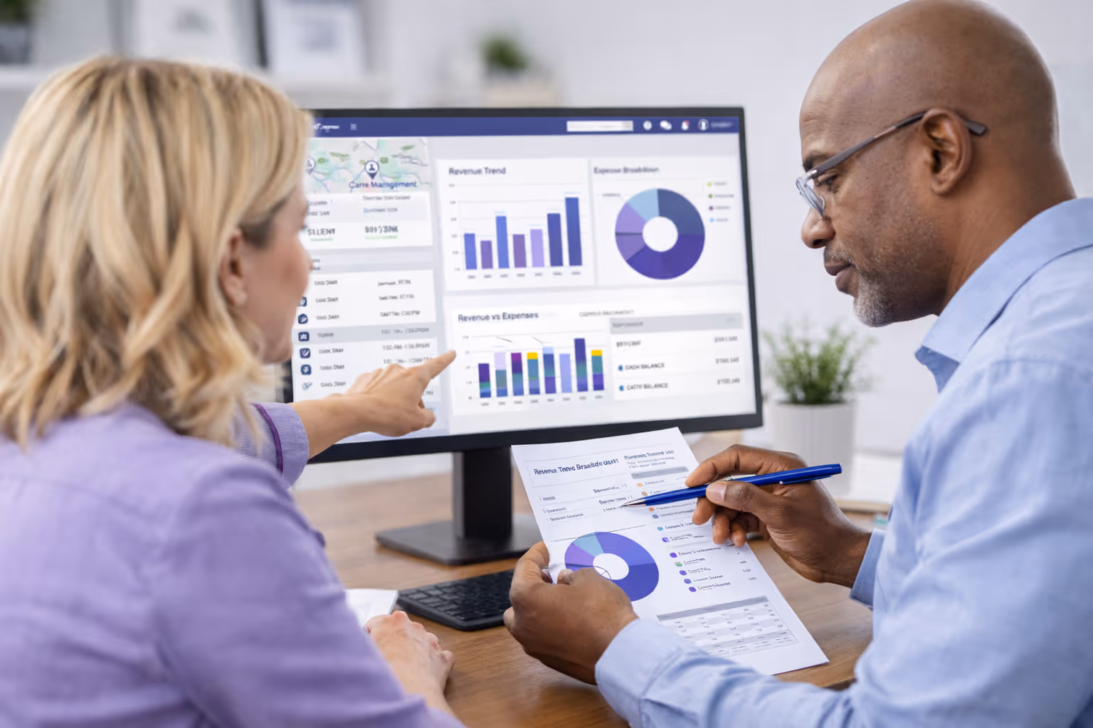 Operations and finance leaders reviewing care management software healthcare data and financial insights for a home care agency