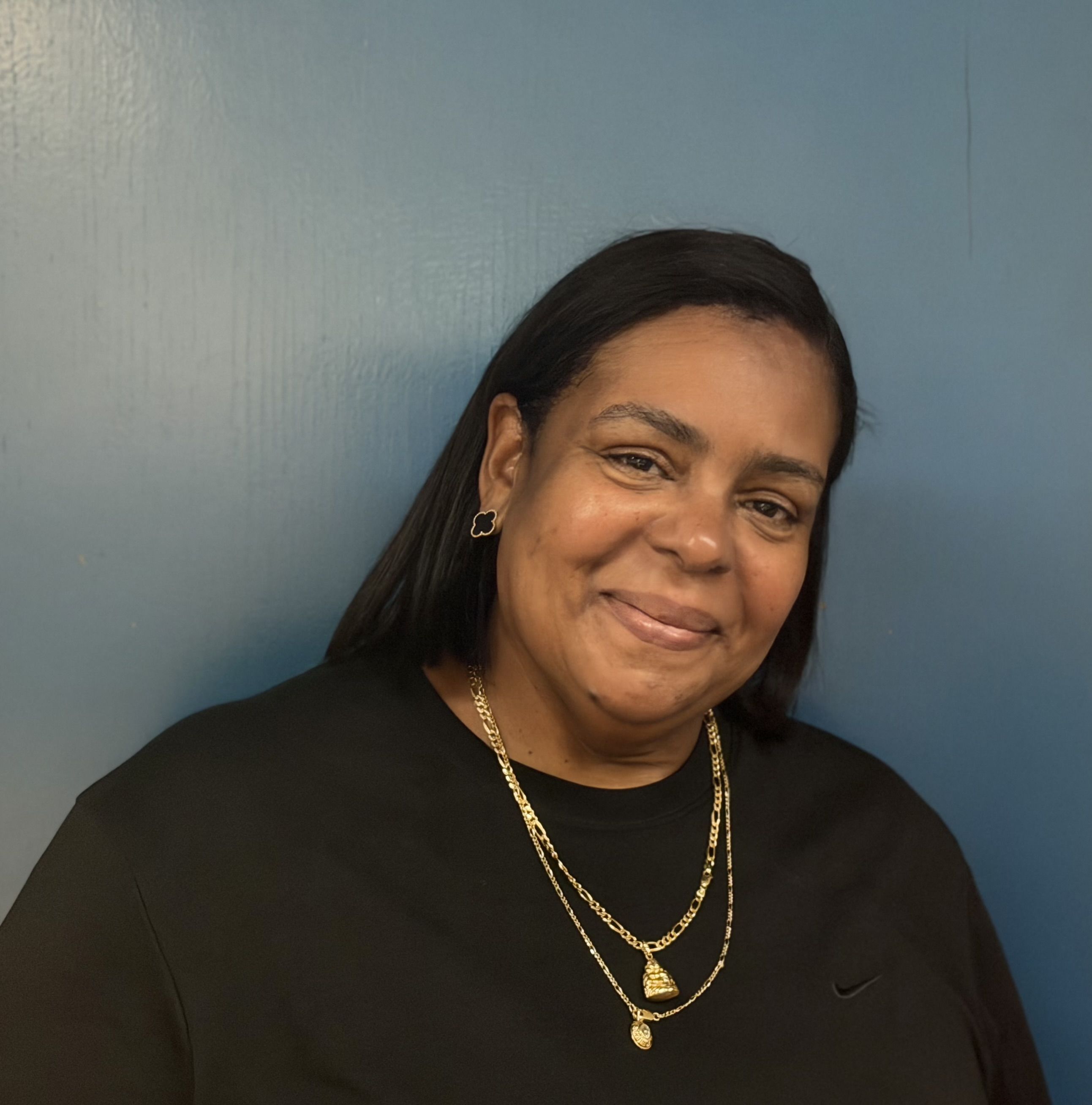 Miosoty Escalante smiling in staff portrait photo