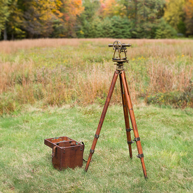 Vintage land surveying equipment.
