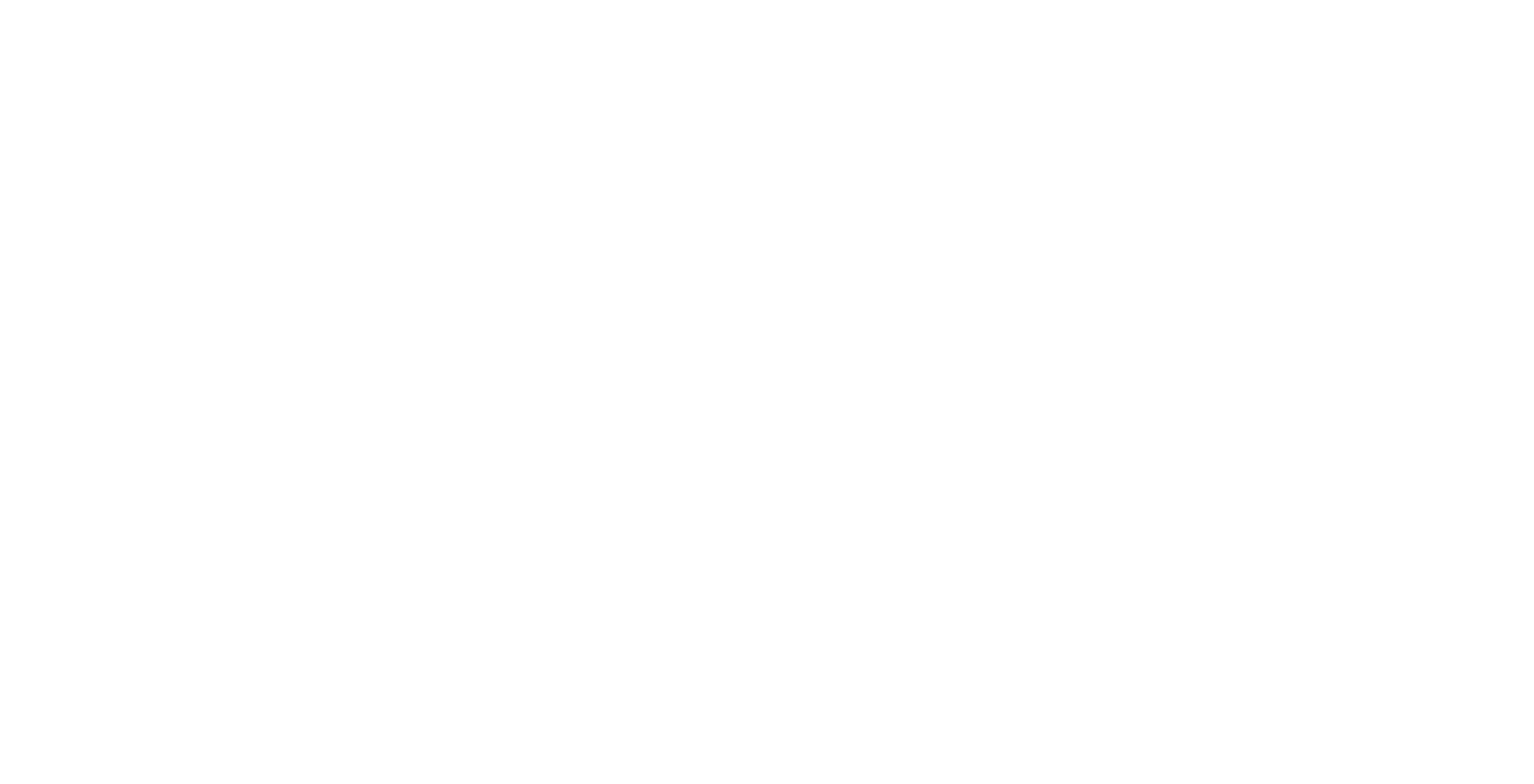 White airplane flying against a black background leaving a curved contrail.
