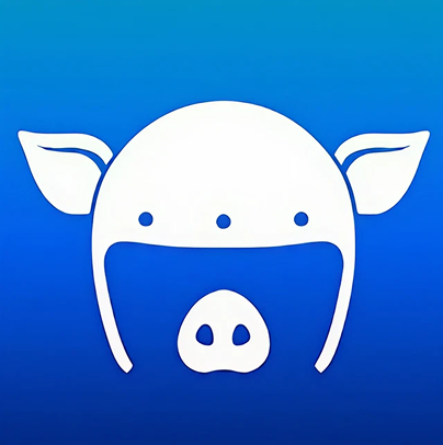 Smiling middle-aged man wearing a dark coat in a warmly lit indoor setting.