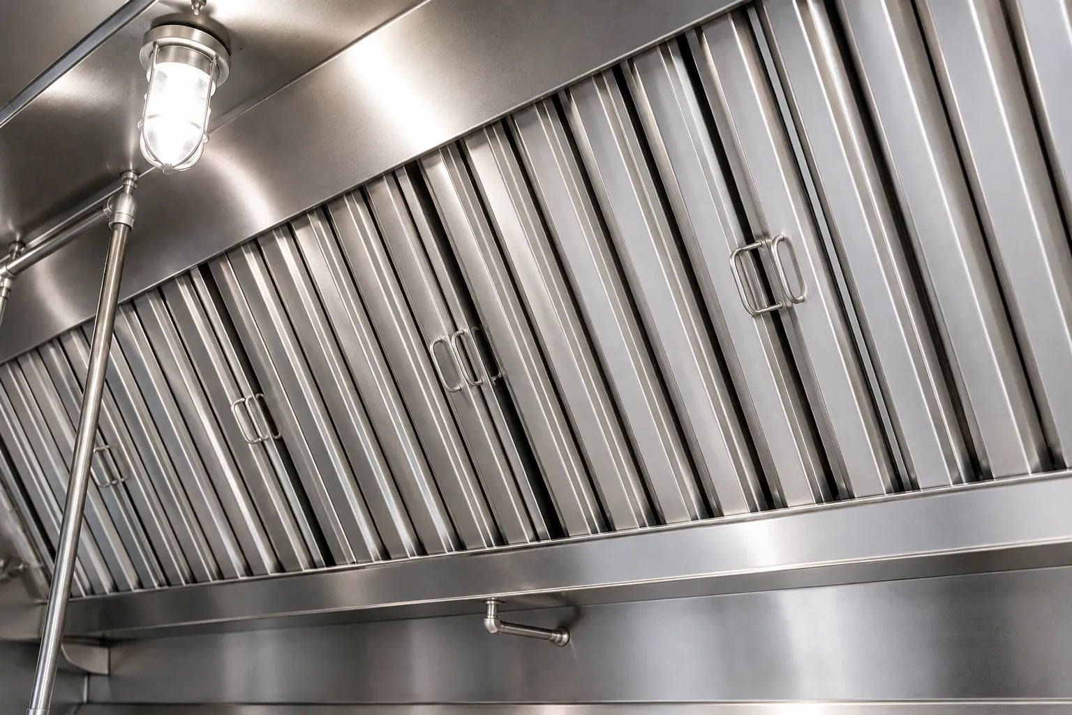 Clean hood-filters at a restaurant showing the commercial cleaning and sanitation plan.