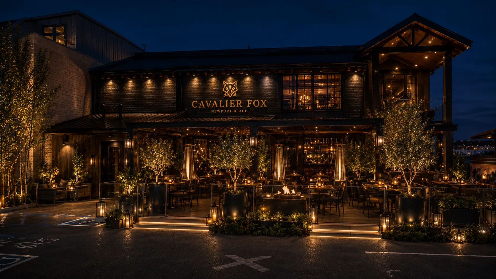 Cavalier Fox restaurant exterior lit up at night.