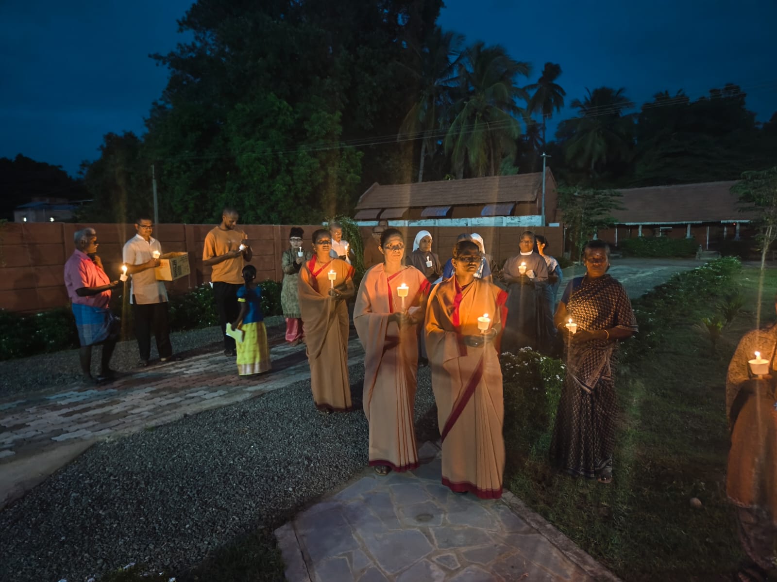 Candlelit procession for world peace at Shantivanam, South India