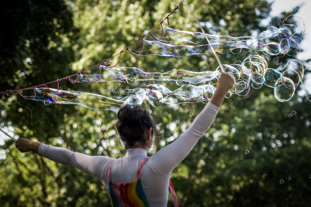 Giant bubble surrounding a child at a kids party