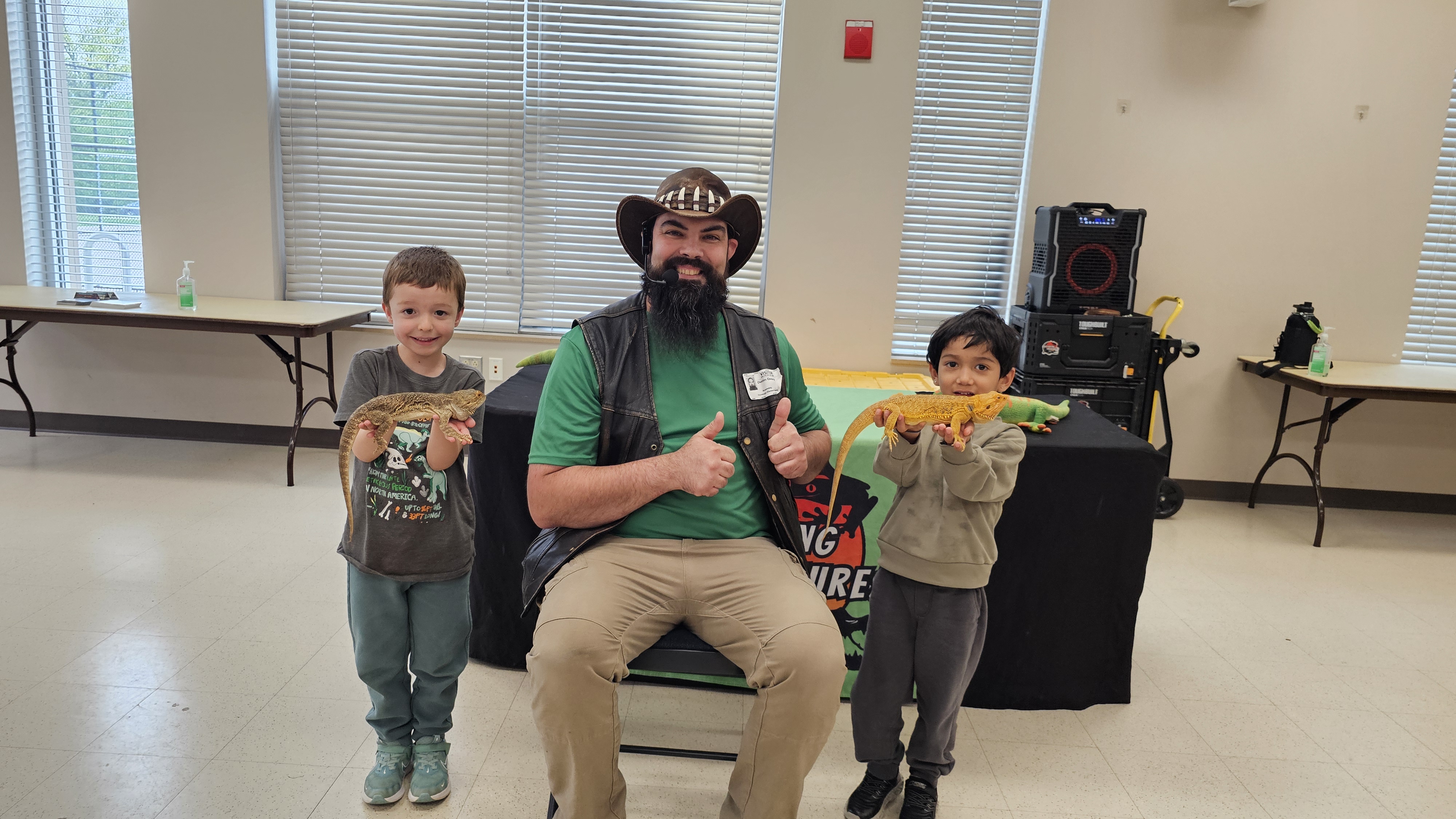 Live creature show with reptile at a DMV birthday party