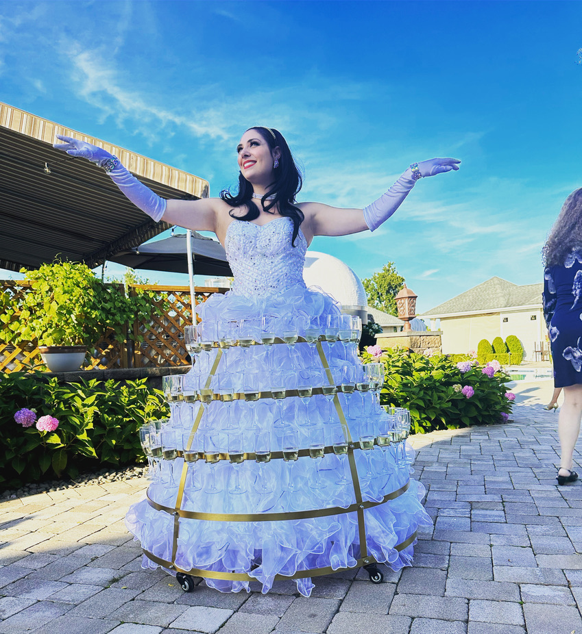 Elegant champagne service performer at a cocktail reception