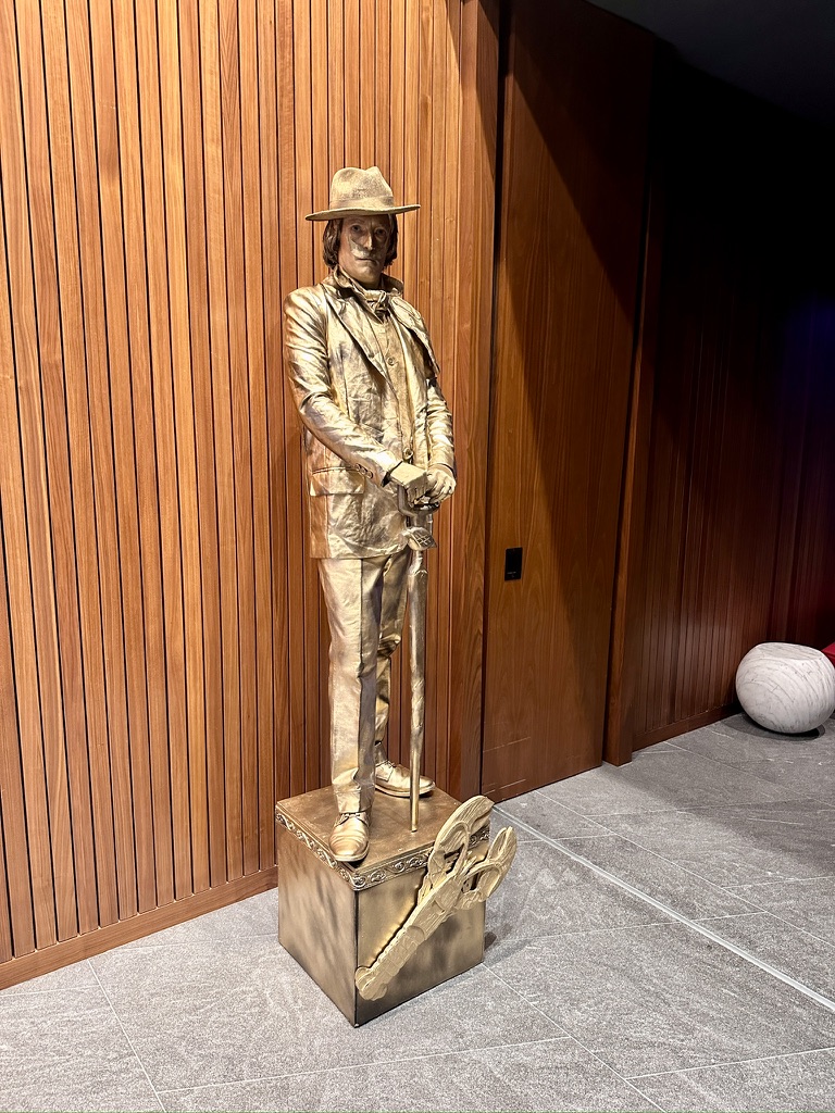Living statue in custom finish at an art event