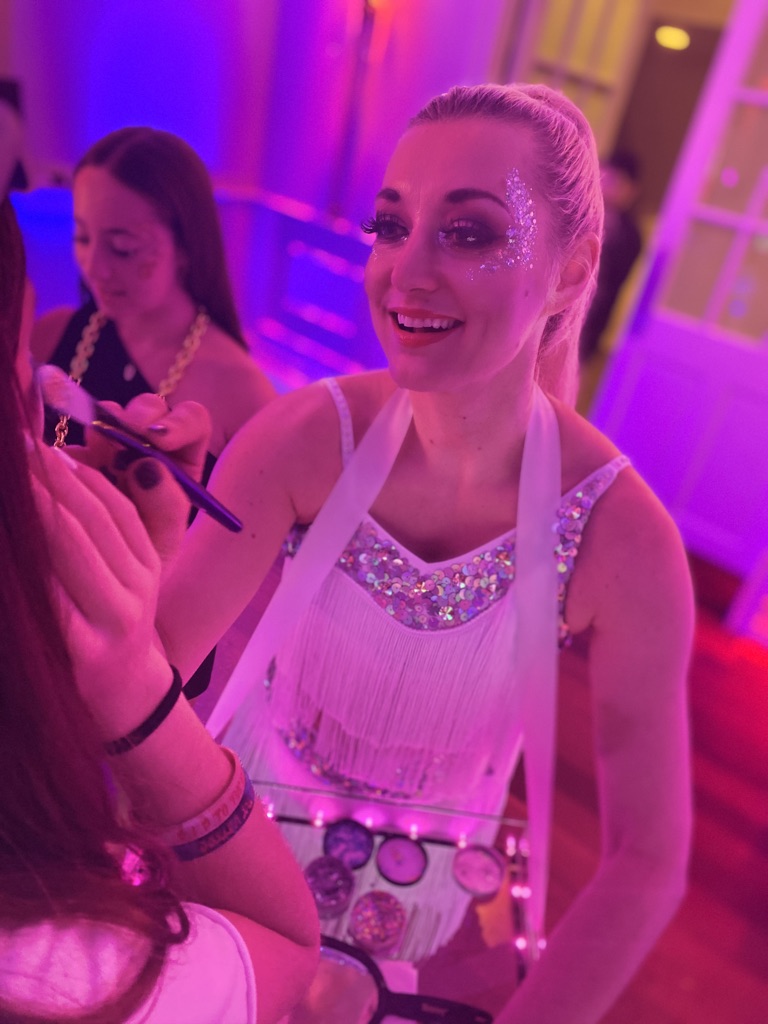 Beauty station applying gems at a Baltimore corporate event