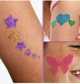 Glitter tattoo being applied at a sparkle station at a kids party