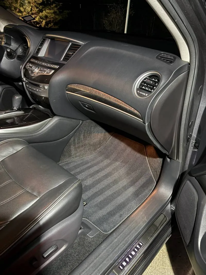 Expert mobile interior detailing service on gray car dashboard and seats in Boerne TX