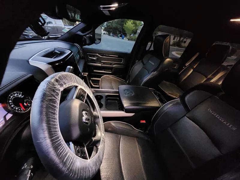 Mobile auto interior steam cleaning to sanitize vents, cup holders, and door panels in San Antonio, Texas.