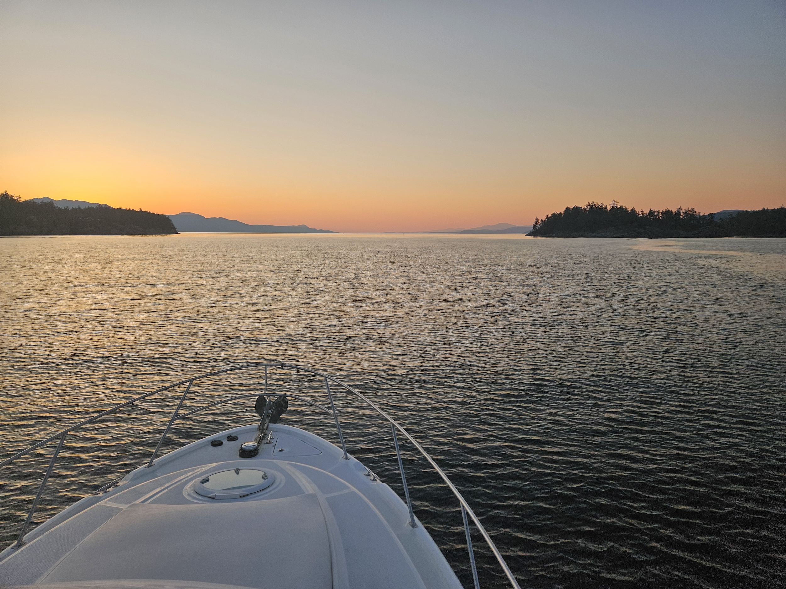 Sun sets into the ocean while enroute