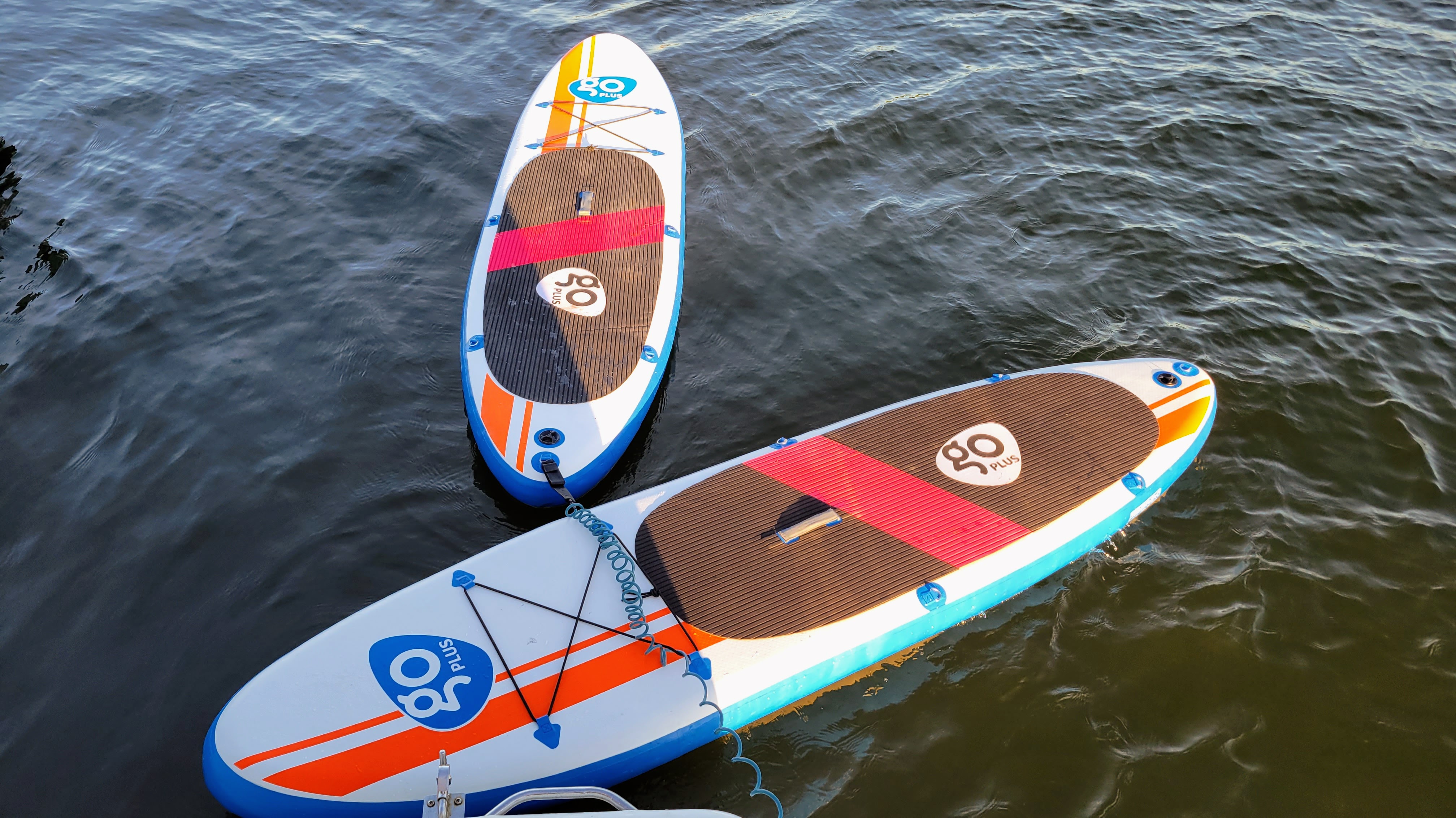 Two paddle boards in the water
