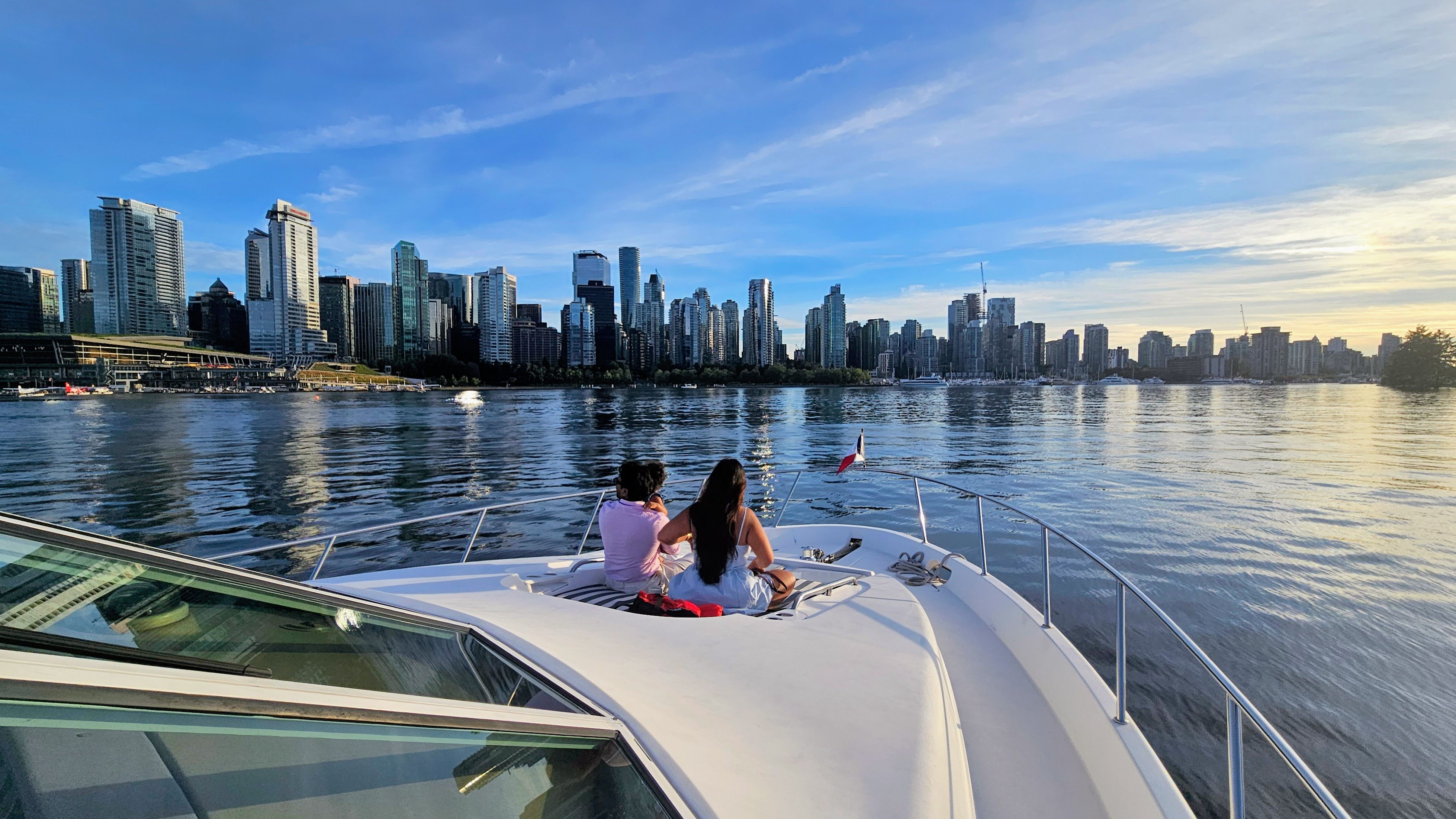 A captivating view of the city reflected in the calm waters, creating a picturesque scene that captures the essence of urban life.