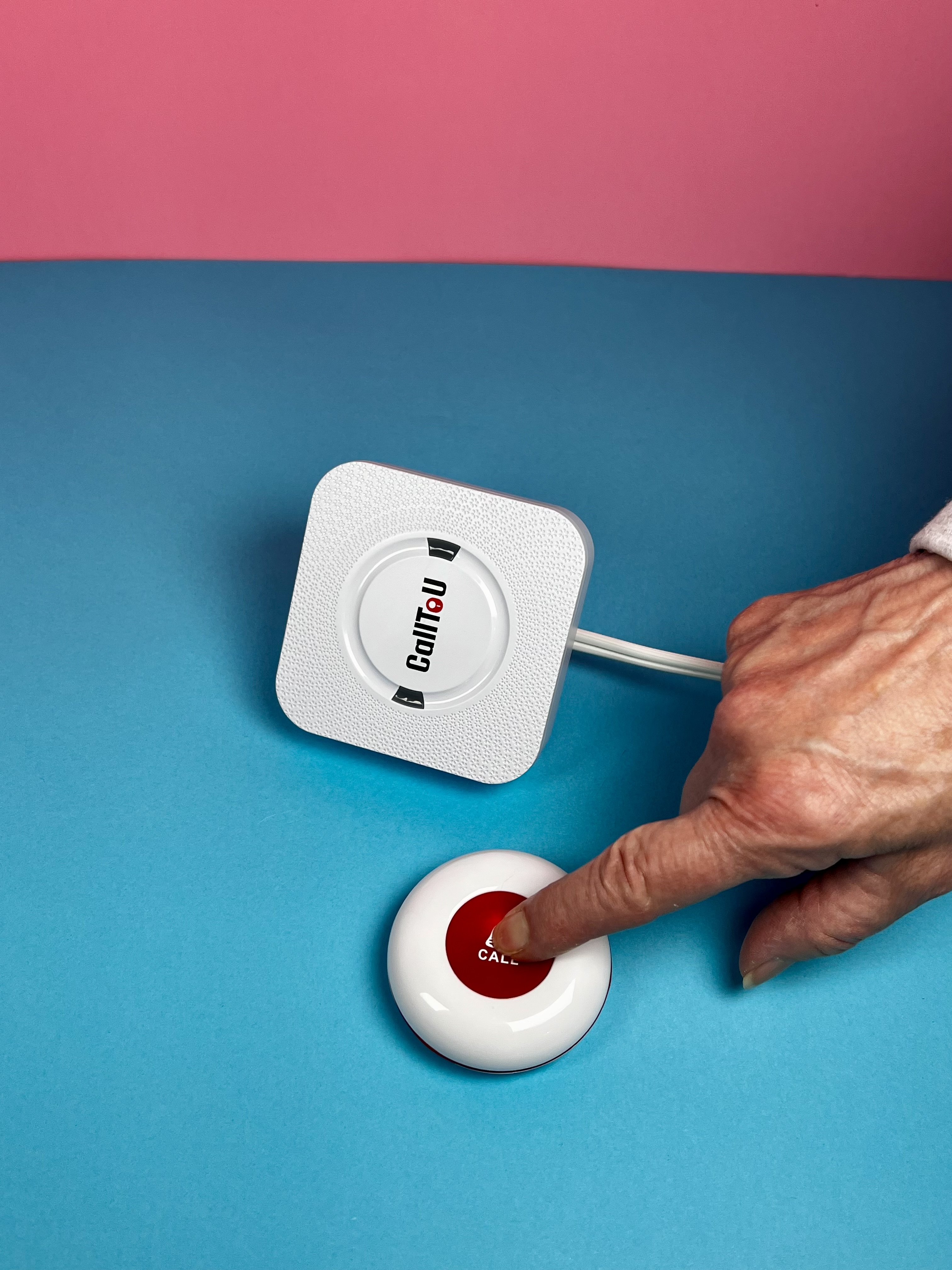 Weighted silverware arranged around a white plate on a blue background.