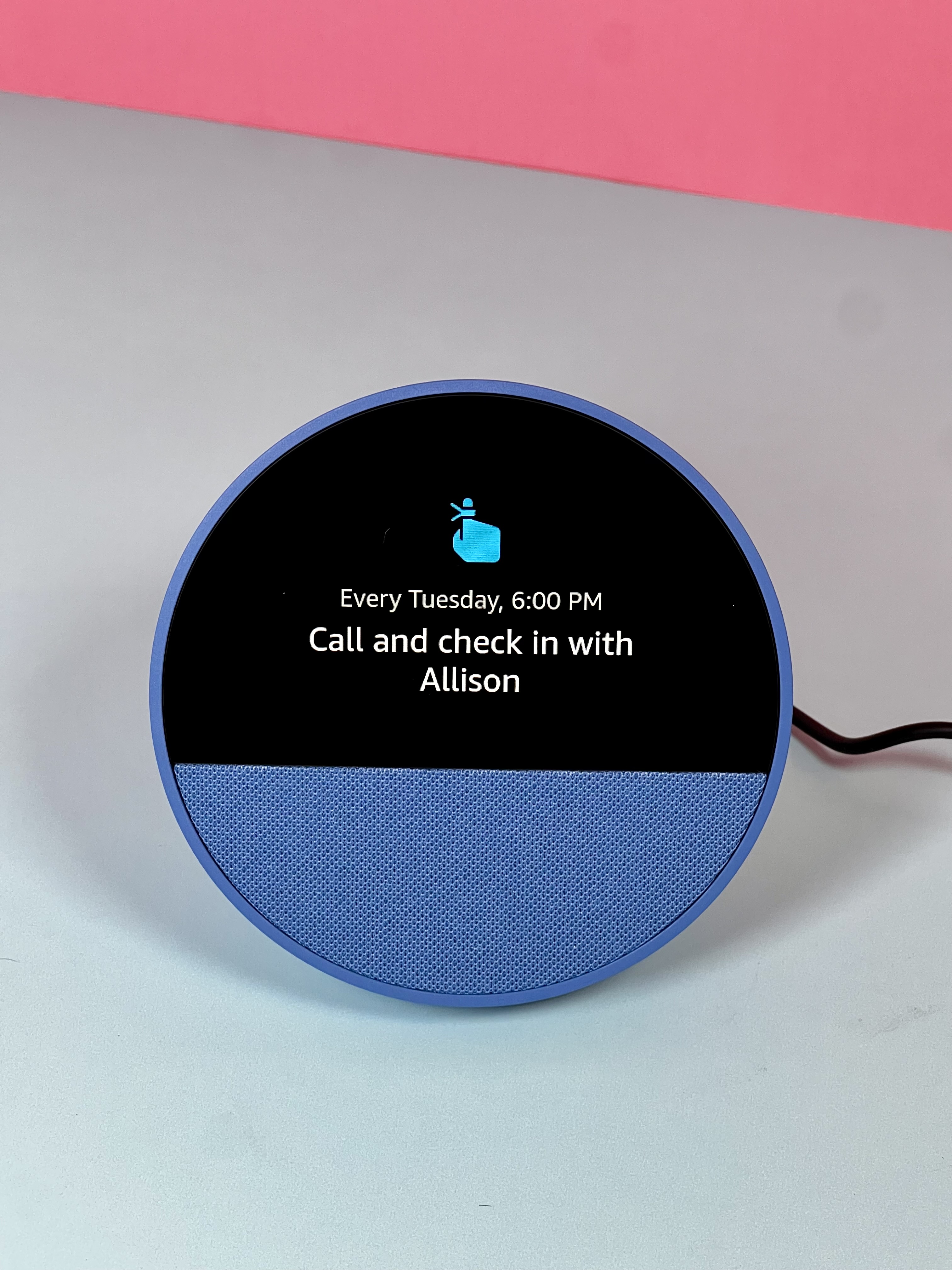 Amazon Echo Show displaying a reminder to call and check in with a family member