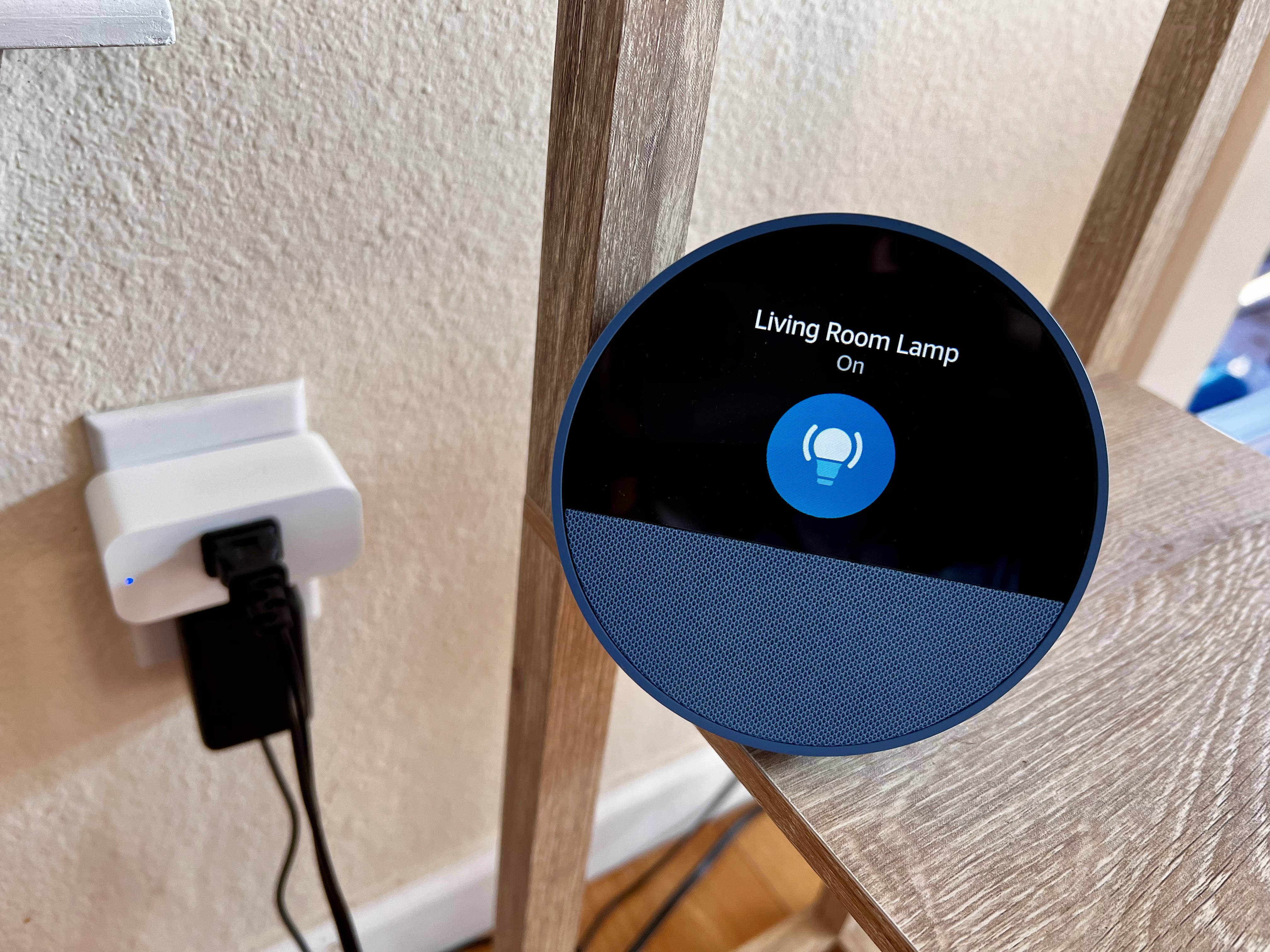 Alexa smart speaker displaying a spoken reminder for a doctor’s appointment.