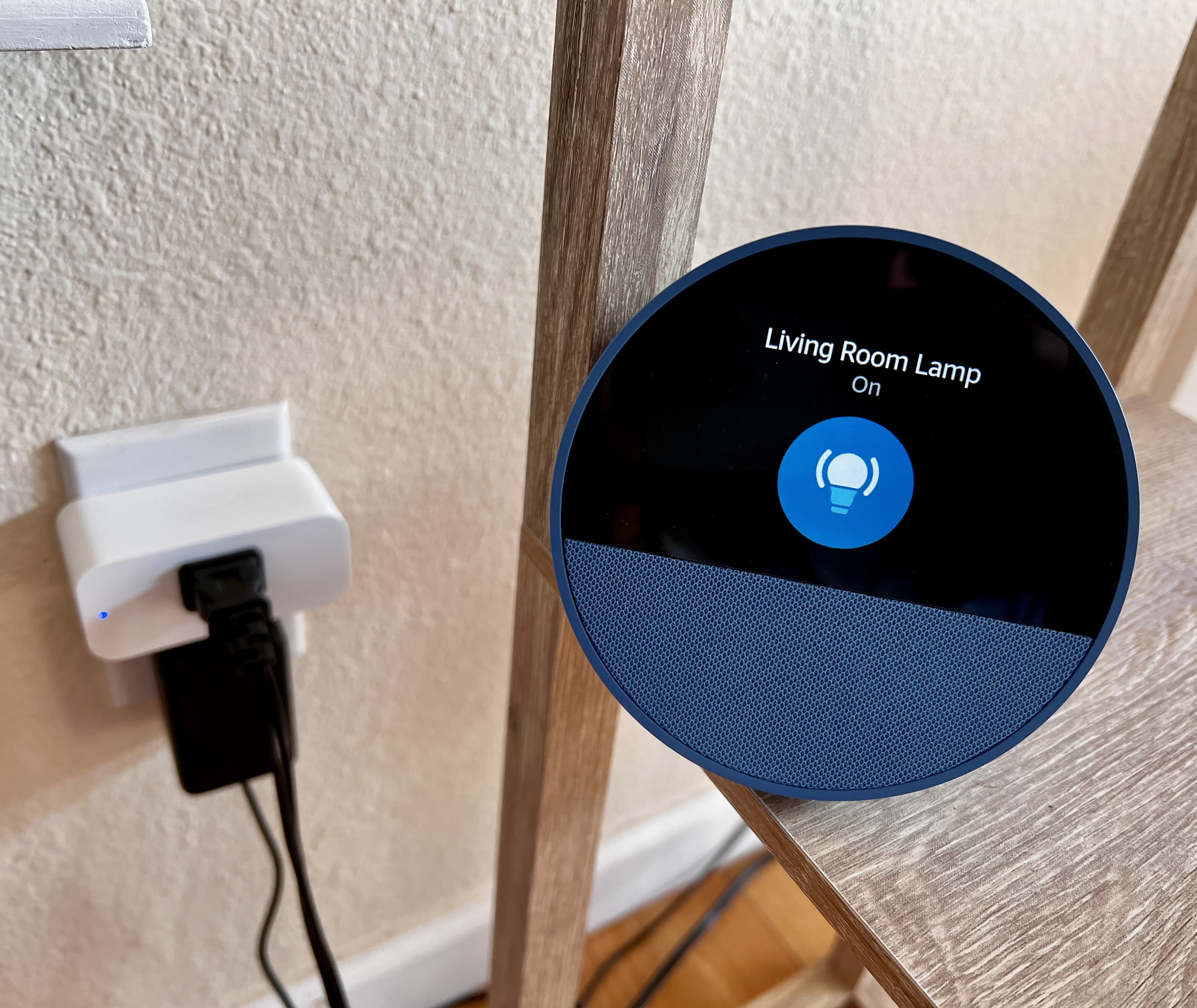 Alexa smart speaker displaying a spoken reminder for a doctor’s appointment.