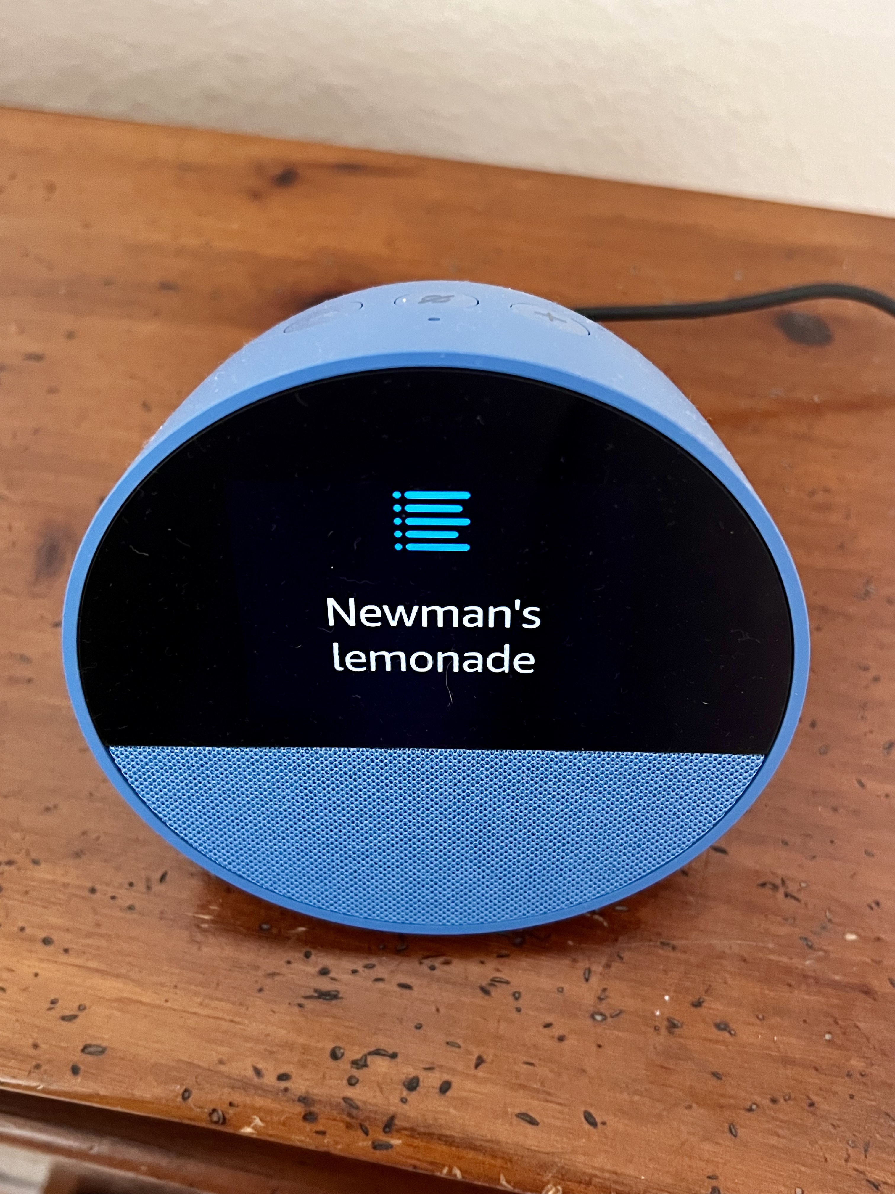 Alexa smart speaker displaying a spoken reminder for a doctor’s appointment.