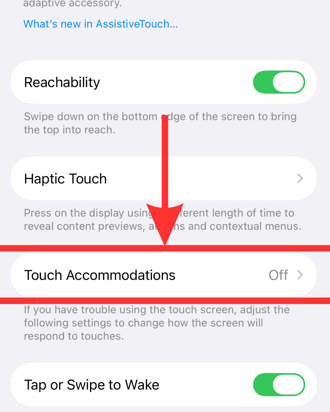 iPhone Touch settings menu with a red arrow pointing down to Touch Accommodations.