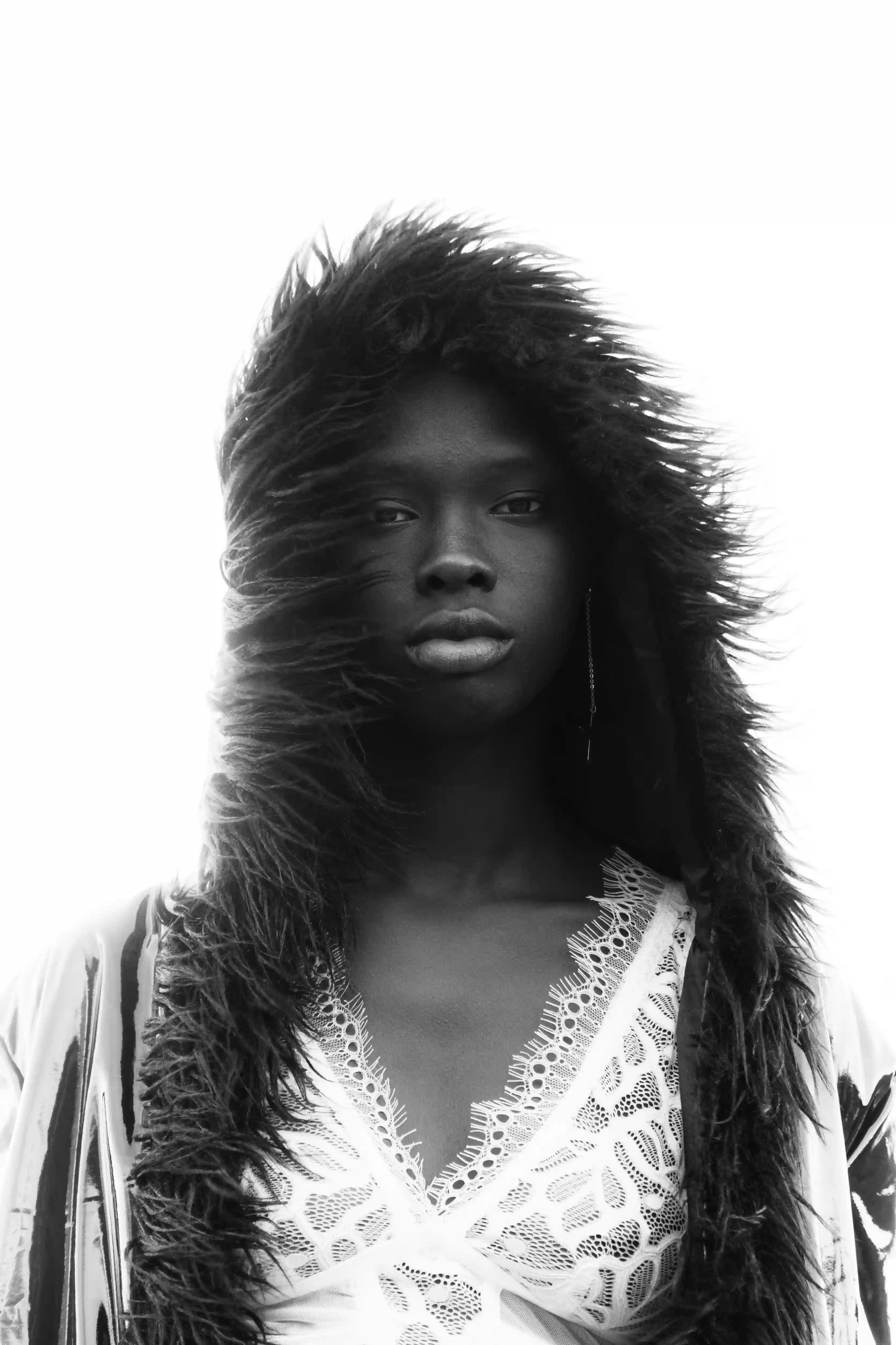 Portrait of female model with voluminous natural hair, part of the Cover Page Dubai international model roster
